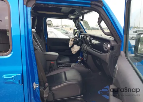 2023 Jeep Wrangler 4-Door Sahara Altitude 4X4 z USA, uszkodzony, nr VIN 1C4HJXEG9PW666649